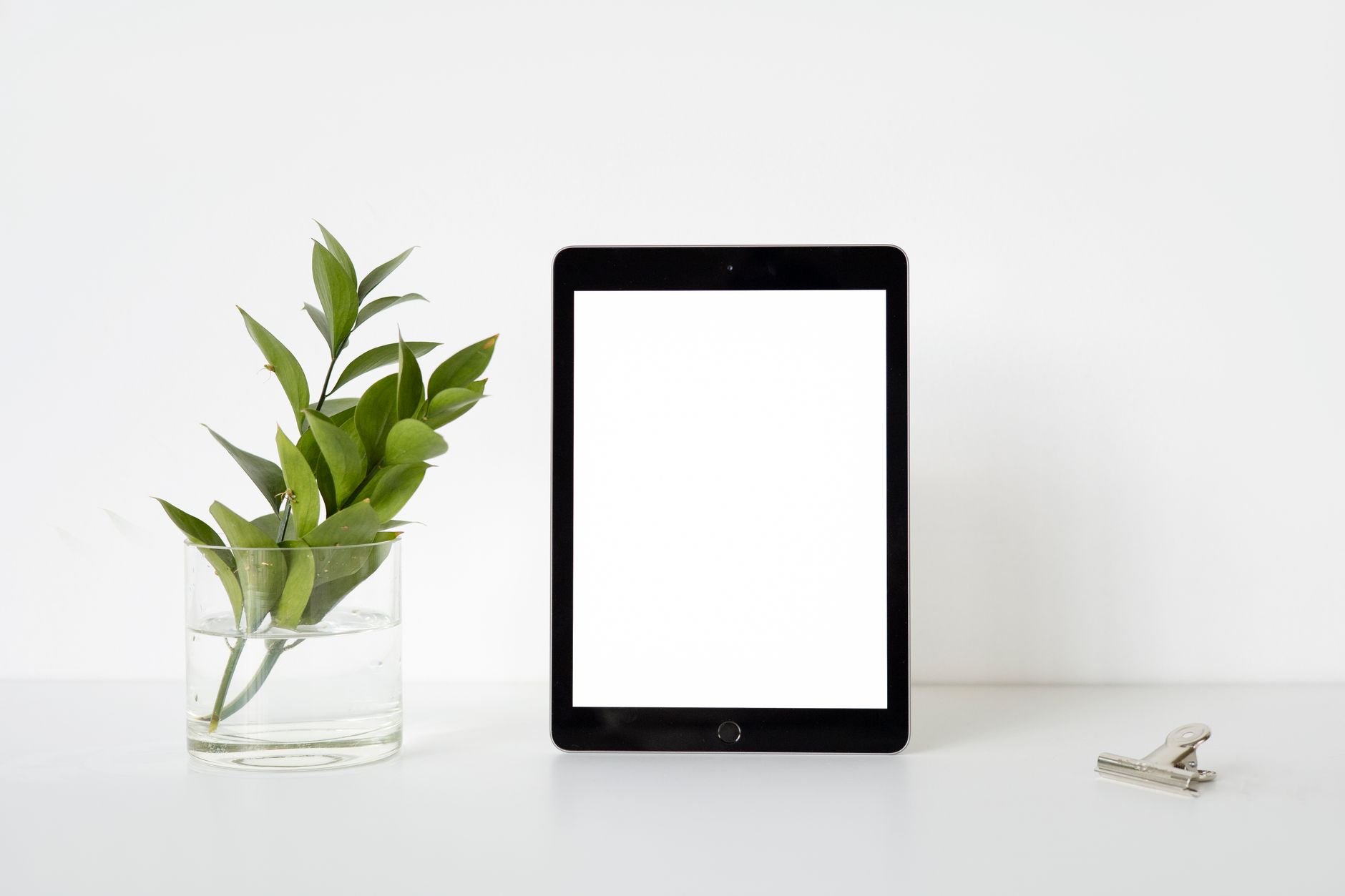 A tablet with a clean white screen showing a product mockup.